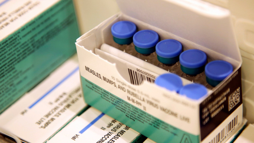 In this March 27, 2019, file photo, vials of measles, mumps and rubella vaccine sit in a cooler at the Rockland County Health Department in Pomona, N.Y. Research released on Thursday, Oct. 31, 2019, shows yet another reason to vaccinate children against measles. After a bout of measles, youngsters are more vulnerable to other germs