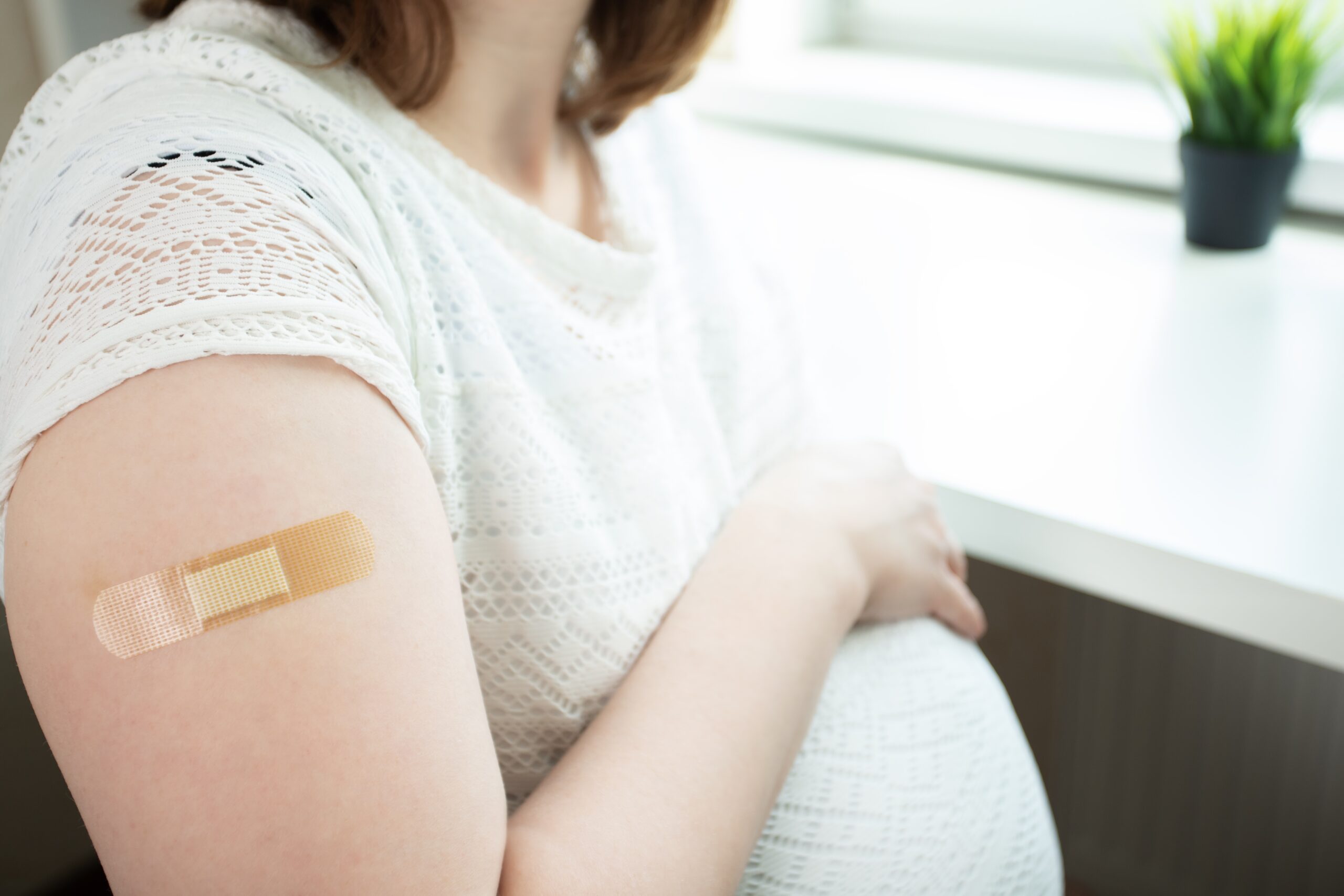 Pregnant woman after receiving a vaccine